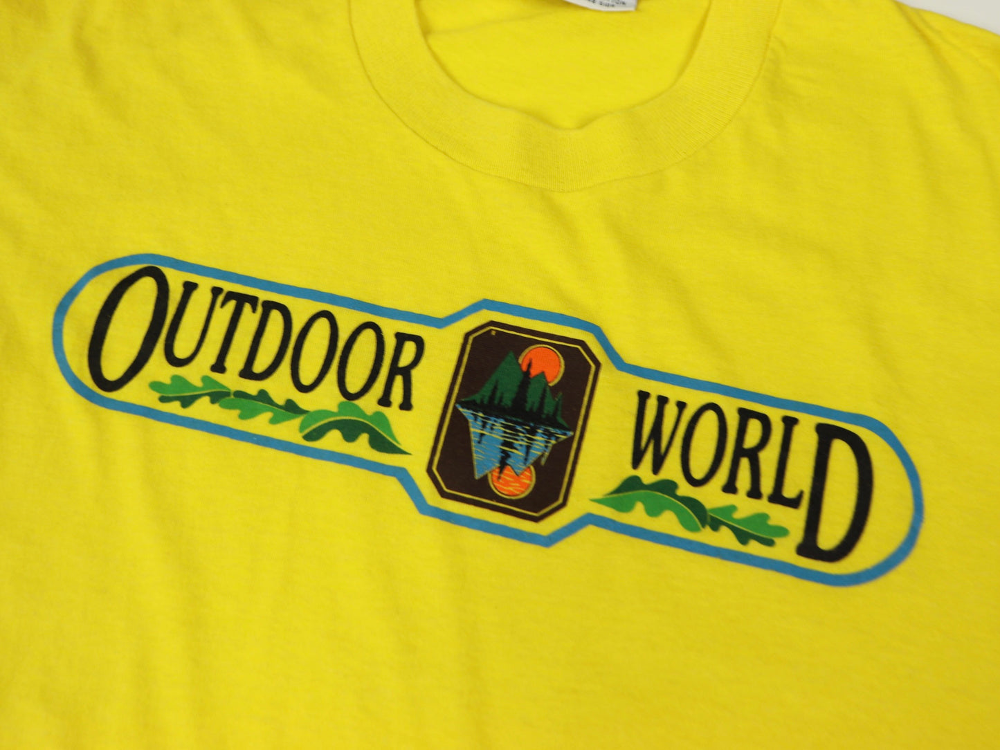 Yellow Outdoor World T-shirt, 1980s Vintage