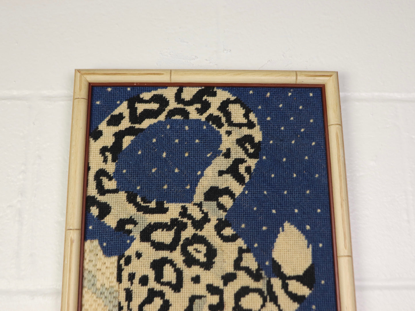 Cross-stitch snow leopard framed art, 1970s vintage