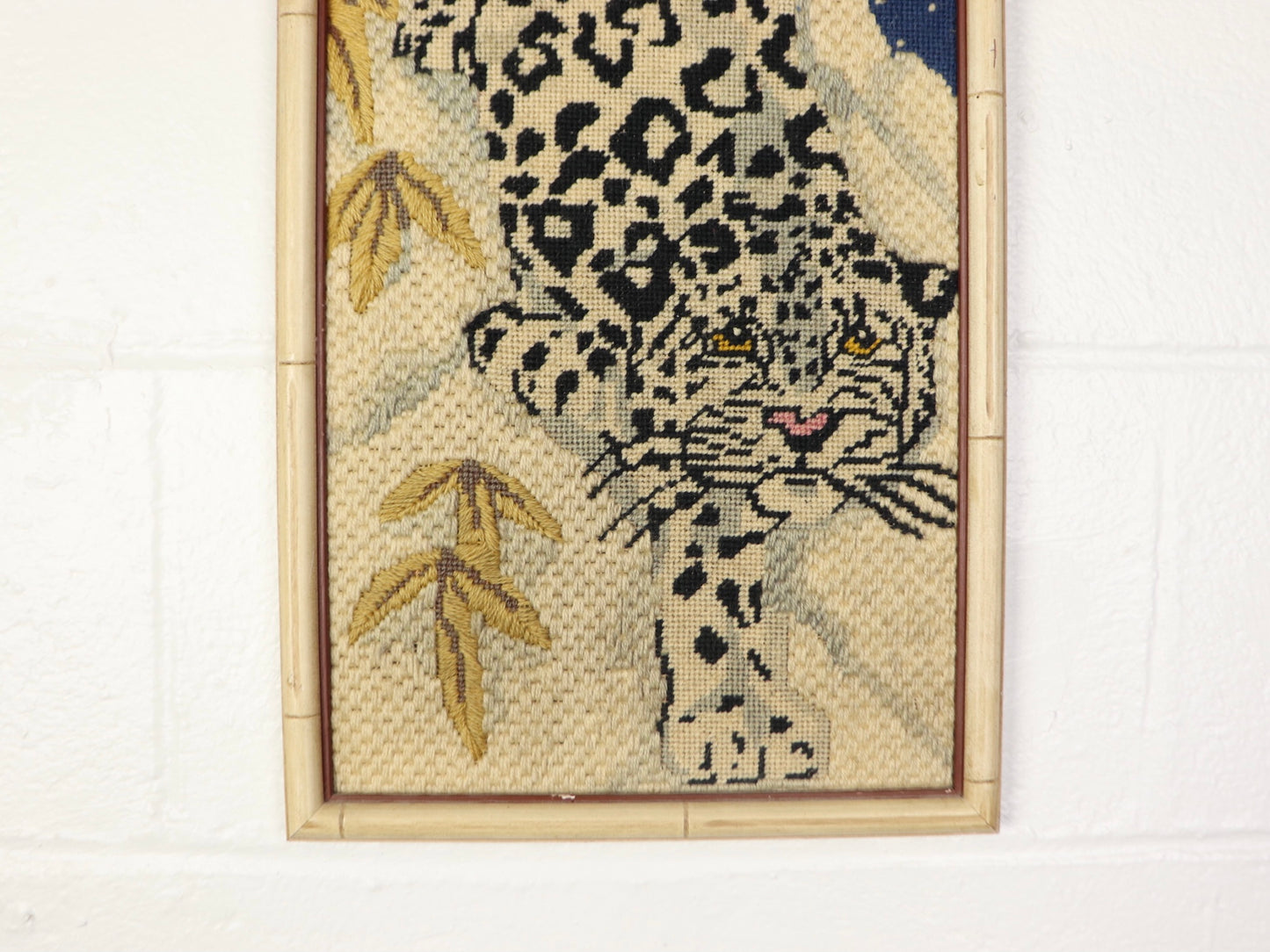 Cross-stitch snow leopard framed art, 1970s vintage